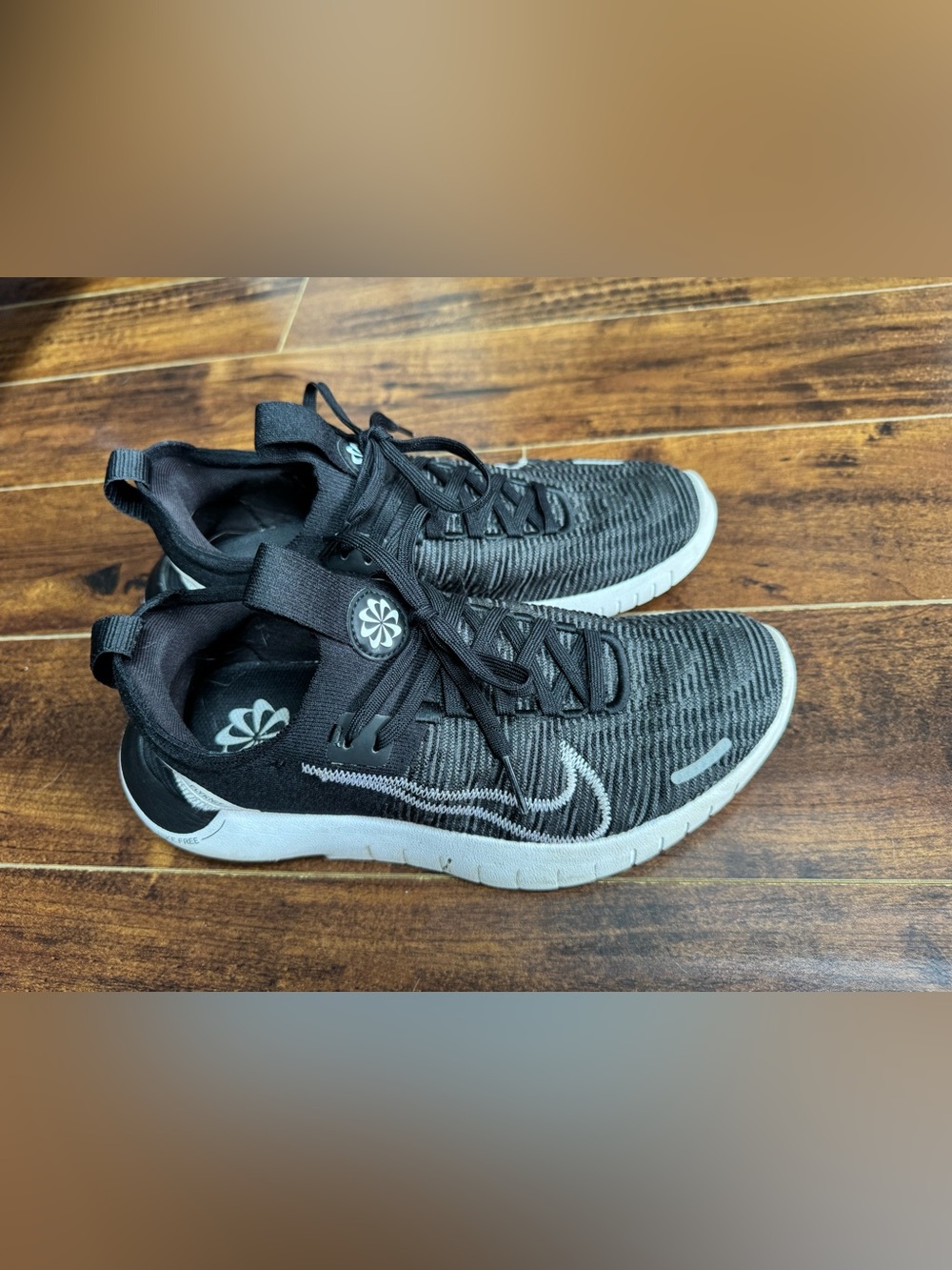 Nike Black and White free run  for women size 8.5